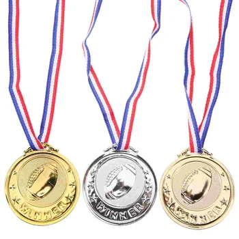Награды конкурса 3шт медаль висит спартакиады медаль круглая медаль
